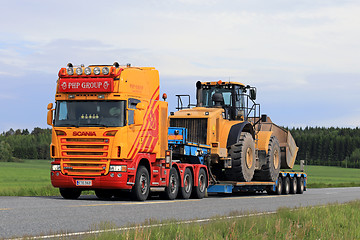 Image showing Customized Semi Trailer Hauls Large Wheel Loader 