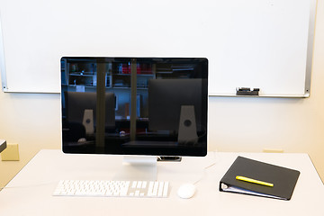 Image showing Computer Keyboard Monitor Desk White Board Classroom