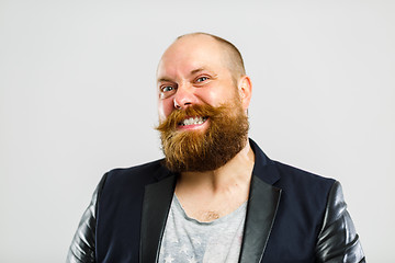 Image showing Laughing brutal man with beard