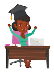 Image showing Graduate using laptop for education.