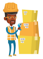 Image showing Warehouse worker scanning barcode on box.