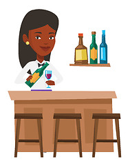 Image showing Bartender standing at the bar counter.