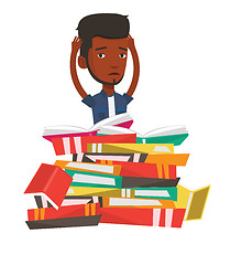 Image showing Student sitting in huge pile of books.