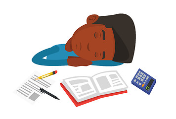 Image showing Male student sleeping at the desk with book.