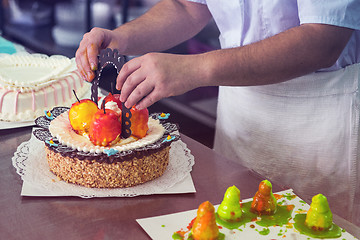 Image showing Manual cakes production