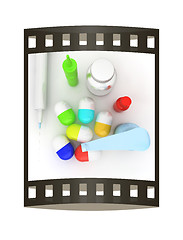 Image showing Syringe, tablet, pill jar. 3D illustration. The film strip