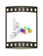 Image showing Syringe, tablet, pill jar. 3D illustration. The film strip