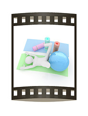 Image showing 3d man on a karemat with fitness ball. 3D illustration. The film