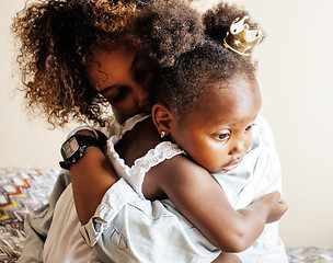 Image showing adorable sweet young afro-american mother with cute little daugh