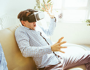 Image showing The man with glasses of virtual reality. Future technology concept.