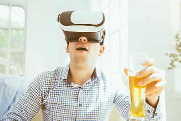 Image showing The man with glasses of virtual reality. Future technology concept.