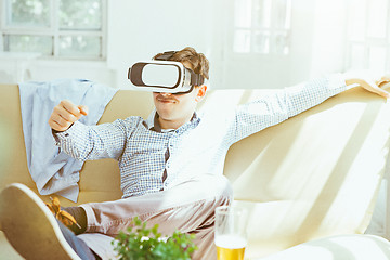 Image showing The man with glasses of virtual reality. Future technology concept.