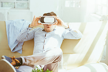 Image showing The man with glasses of virtual reality. Future technology concept.