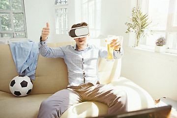 Image showing The man with glasses of virtual reality. Future technology concept.