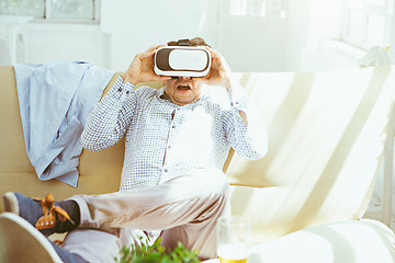 Image showing The man with glasses of virtual reality. Future technology concept.