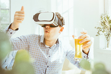 Image showing The man with glasses of virtual reality. Future technology concept.