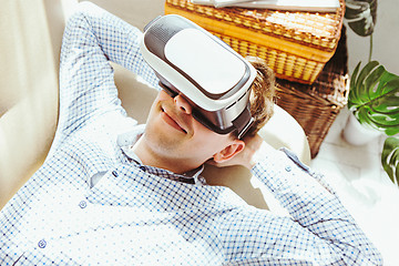 Image showing The man with glasses of virtual reality. Future technology concept.