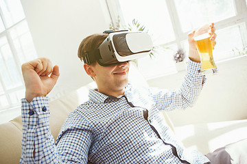 Image showing The man with glasses of virtual reality. Future technology concept.