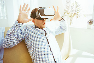 Image showing The man with glasses of virtual reality. Future technology concept.