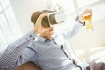 Image showing The man with glasses of virtual reality. Future technology concept.