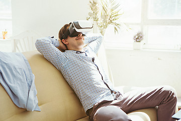 Image showing The man with glasses of virtual reality. Future technology concept.