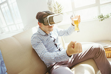 Image showing The man with glasses of virtual reality. Future technology concept.