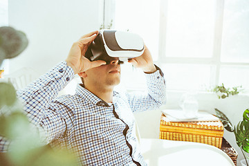 Image showing The man with glasses of virtual reality. Future technology concept.