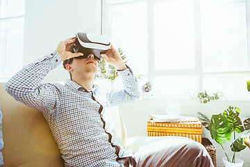 Image showing The man with glasses of virtual reality. Future technology concept.