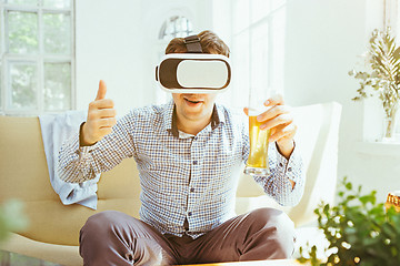 Image showing The man with glasses of virtual reality. Future technology concept.