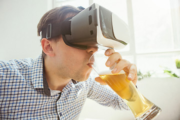 Image showing The man with glasses of virtual reality. Future technology concept.