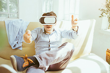 Image showing The man with glasses of virtual reality. Future technology concept.