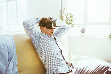 Image showing The man with glasses of virtual reality. Future technology concept.