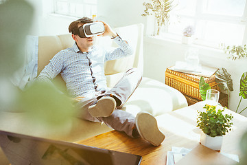 Image showing The man with glasses of virtual reality. Future technology concept.