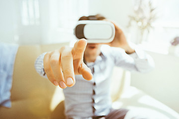 Image showing The man with glasses of virtual reality. Future technology concept.