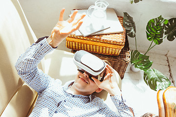 Image showing The man with glasses of virtual reality. Future technology concept.