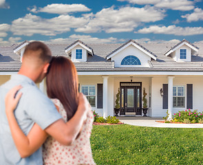 Image showing Young Military Couple Facing Beautiful New House.