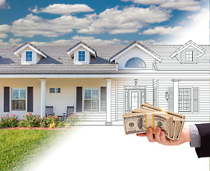 Image showing Hand Holding Stack of Money Over House Drawing Gradating Into Ph