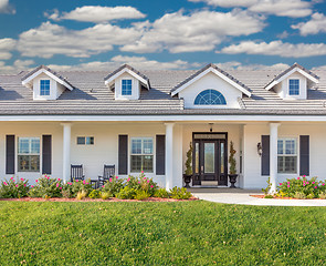 Image showing Beautiful Custom Built Home Facade and Yard.