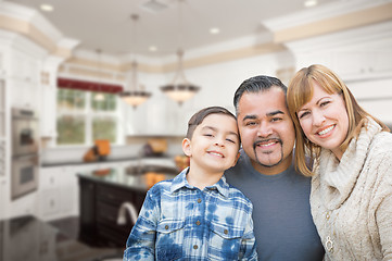 Image showing Young Mixed Race Family Having in Beautiful Custom Kitchen