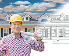 Image showing Male Contractor Wearing Hard Hat In Front of House Drawing Grada