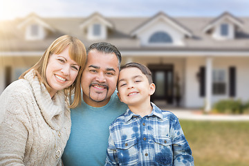 Image showing Mixed Race Family In Front Yard of Beautiful House and Property.