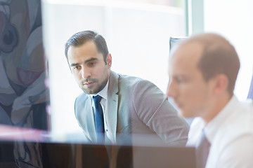 Image showing Business team analyzing data at business meeting.