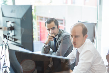 Image showing Business team analyzing data at business meeting.