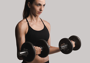 Image showing Working out with dumbbels