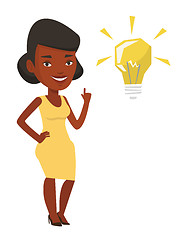 Image showing Student pointing at light bulb vector illustration