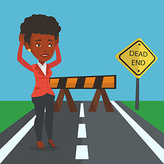 Image showing Business woman looking at road sign dead end.