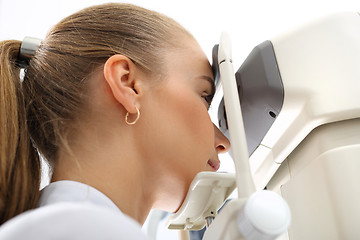 Image showing An eye exam, the patient in ophthalmology clinic Healthy eyes, Cabinet ophthalmic eye examination