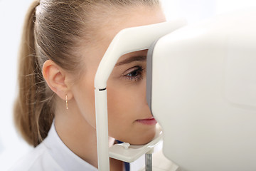 Image showing The pressure in the eye, the patient with an ophthalmologist An eye exam, the patient in ophthalmology clinic