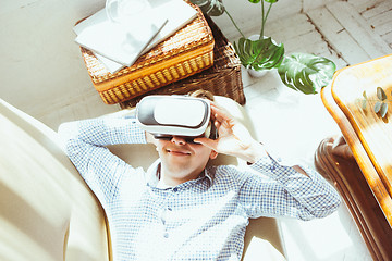 Image showing The man with glasses of virtual reality. Future technology concept.