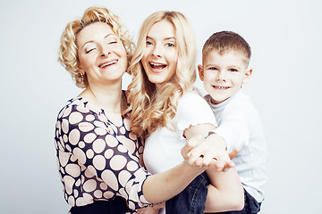 Image showing happy smiling family together posing cheerful on white background, lifestyle people concept, mother with son and teenage daughter isolated